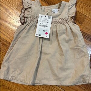 Tan Ruffled Baby Dress